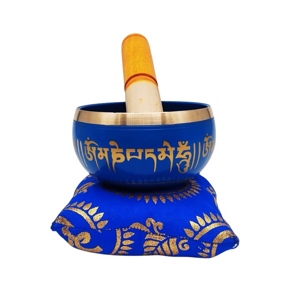 Buddhist singing bowl with blue cushion and striker, front view