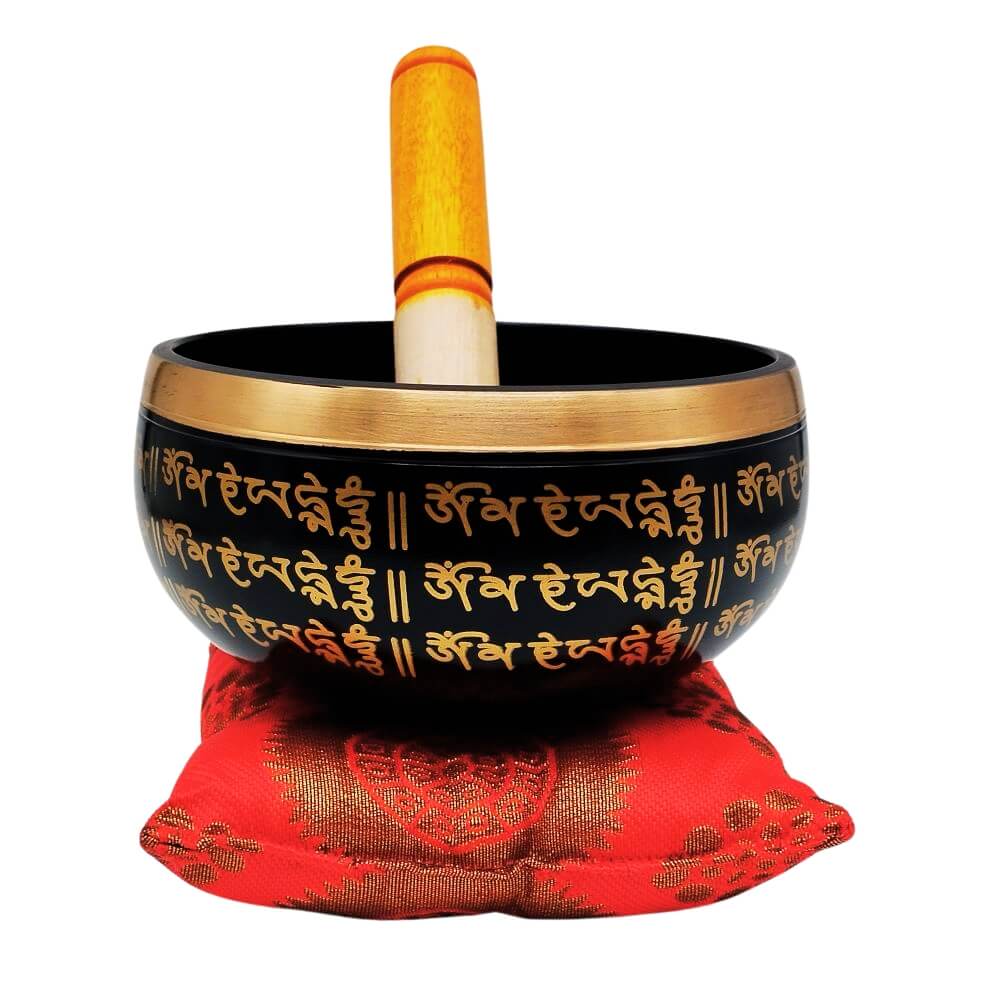 Meditation singing bowl with red cushion and striker, front view